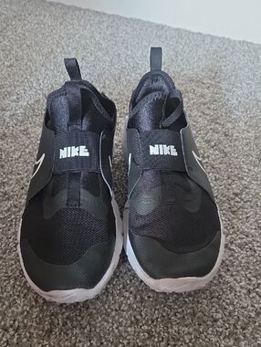 Nike Kids Black and White Slip-On Athletic Sneakers with White Swoosh